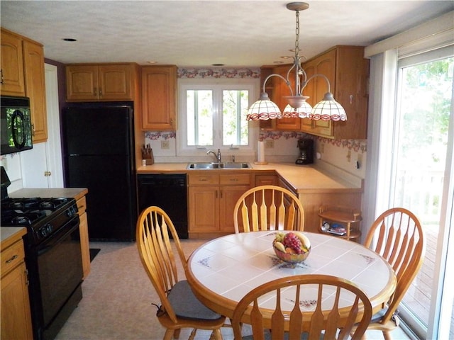 5400 County Road 37, Richmond, NY 14466 - kitchen featuring black appliances, a sink, healthy amount of natural light, and decorative light fixtures