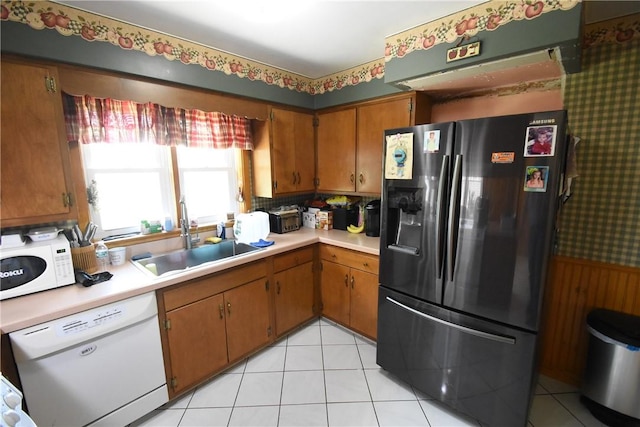806 Mount Zoar St, Southport, NY 14904 - kitchen featuring white appliances, light countertops, brown cabinets, and light tile patterned floors