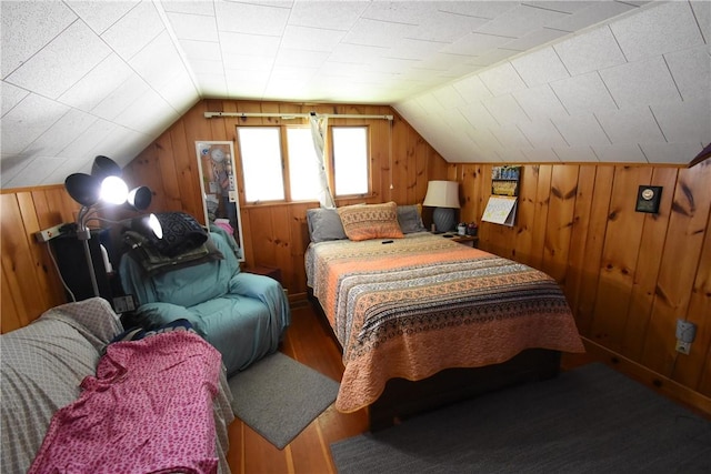 806 Mount Zoar St, Southport, NY 14904 - bedroom with wooden walls, wood finished floors, and lofted ceiling