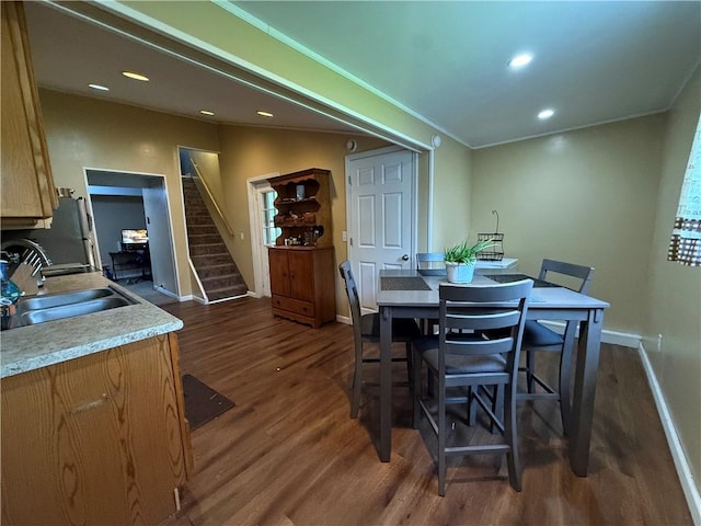 760 Spruce St, Southport, NY 14904 - dining space featuring dark wood finished floors, baseboards, stairs, recessed lighting, and crown molding