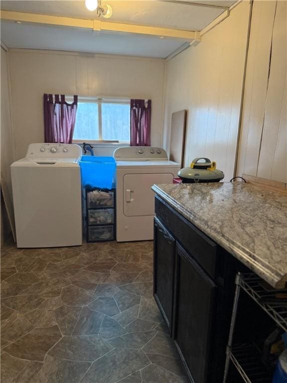 760 Spruce St, Southport, NY 14904 - washroom featuring washer and dryer and dark stone finish floors