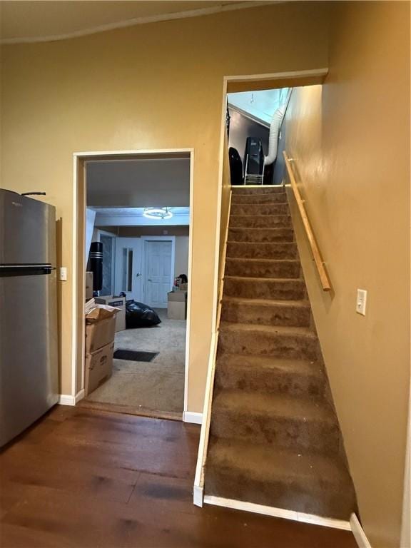 760 Spruce St, Southport, NY 14904 - staircase with wood finished floors, ornamental molding, and baseboards