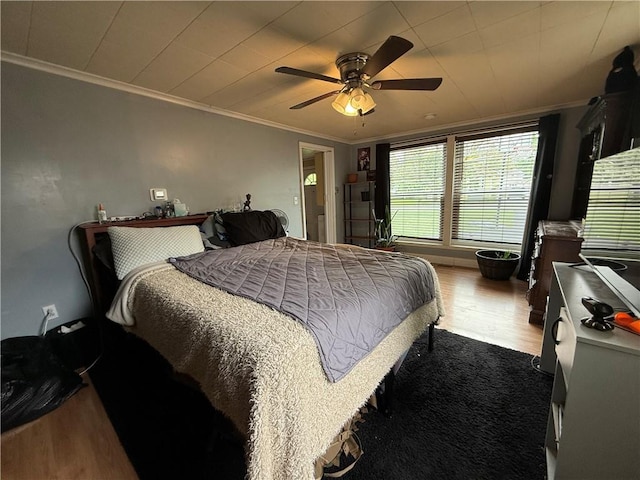 760 Spruce St, Southport, NY 14904 - bedroom with ornamental molding, wood finished floors, and a ceiling fan