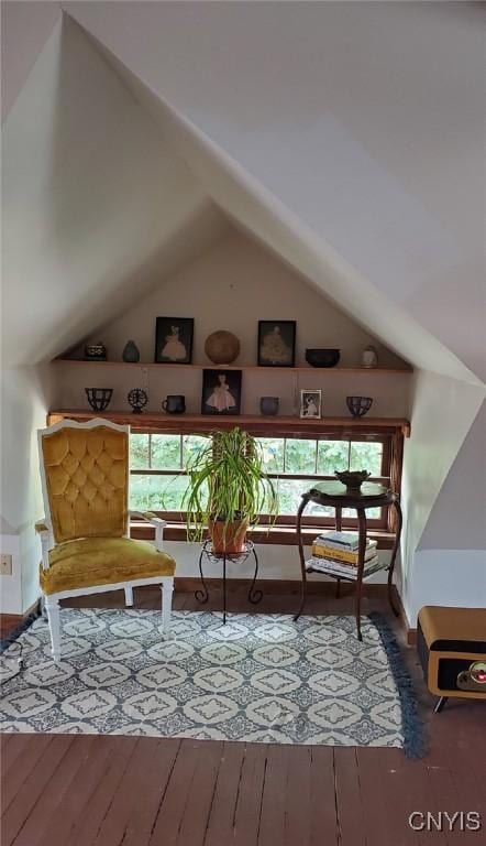 18 Avery Pl, Utica, NY 13502 - sitting room featuring healthy amount of natural light, wood finished floors, and vaulted ceiling