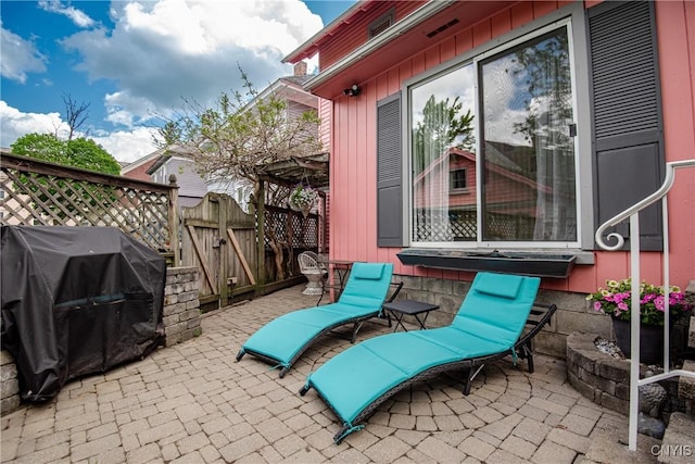 18 Avery Pl, Utica, NY 13502 - view of patio / terrace featuring fence, grilling area, and a gate