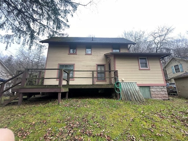 211 Main St, Delhi, NY 13753 - back of property featuring a deck, a lawn, and stairs