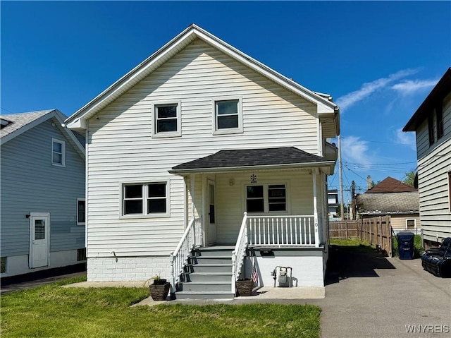 101 Spruce St, Lackawanna, NY 14218 - view of front of house with covered porch, fence, and roof with shingles