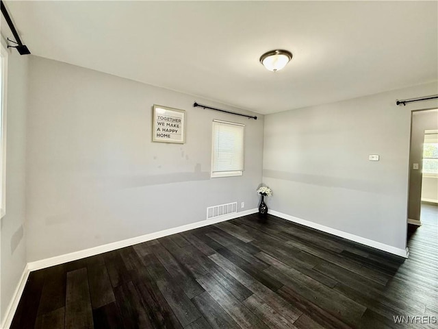 101 Spruce St, Lackawanna, NY 14218 - empty room with dark wood-type flooring and baseboards