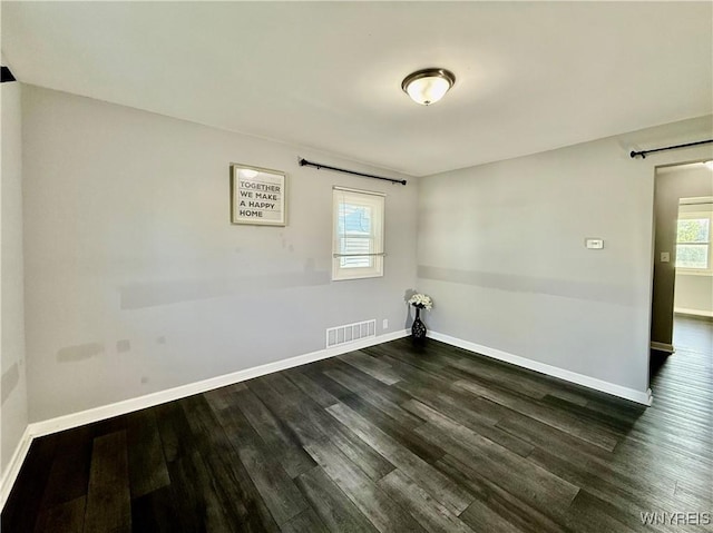 101 Spruce St, Lackawanna, NY 14218 - unfurnished room with baseboards and dark wood finished floors