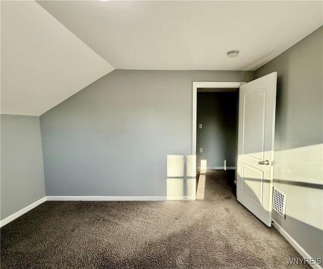 101 Spruce St, Lackawanna, NY 14218 - bonus room with carpet flooring, baseboards, and lofted ceiling