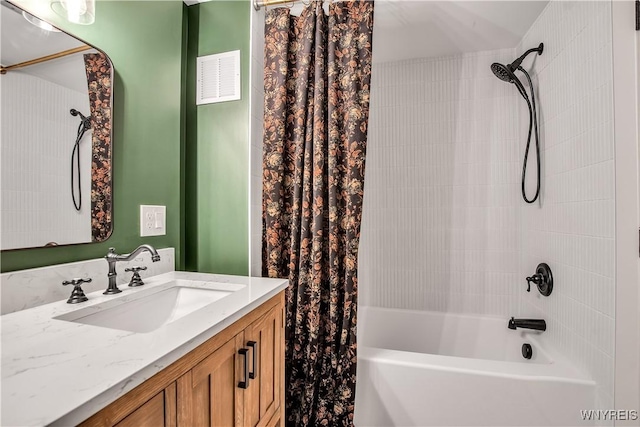 full bathroom featuring shower / tub combo and vanity