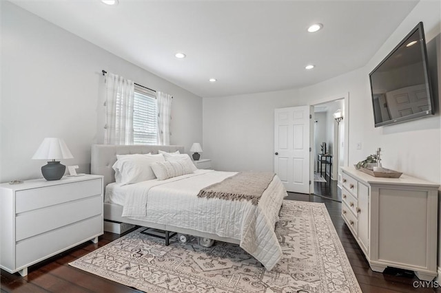 bedroom featuring dark wood-style flooring and recessed lighting