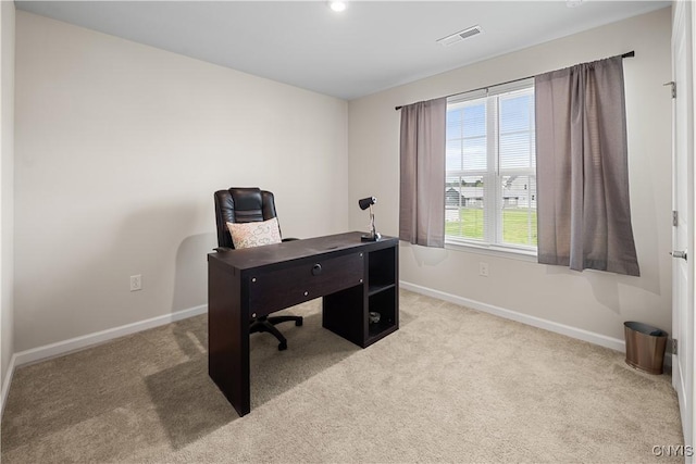 office area featuring baseboards and carpet floors