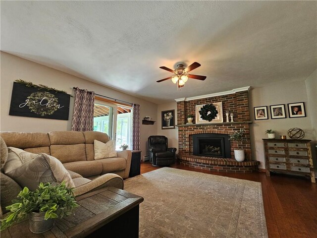 4862 Cross St, Campbell, NY 14821 - living area featuring hardwood / wood-style floors, a ceiling fan, a brick fireplace, and a textured ceiling