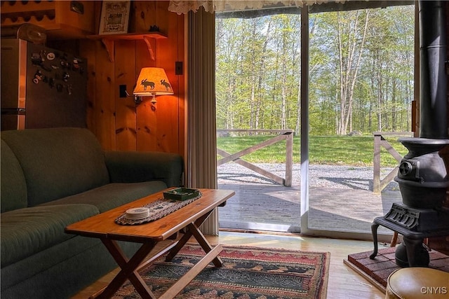 123 Mohawk Dr W, Webb, NY 13420 - living area featuring a wood stove and wood finished floors