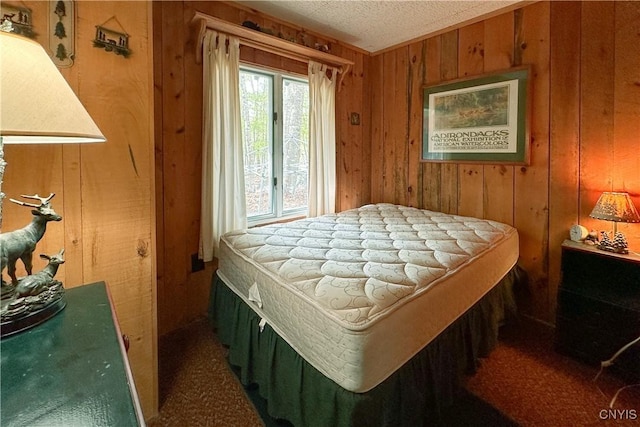 123 Mohawk Dr W, Webb, NY 13420 - bedroom with wood walls and a textured ceiling