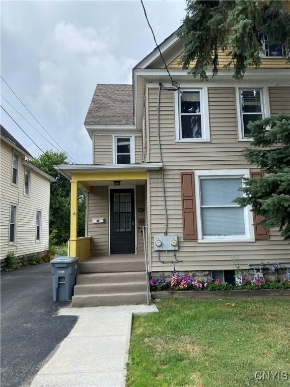 533 Mundy St, Watertown-City, NY 13601 - view of front of house with a porch and a shingled roof