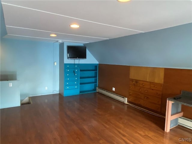 533 Mundy St, Watertown-City, NY 13601 - bonus room featuring a baseboard heating unit, wood finished floors, and recessed lighting
