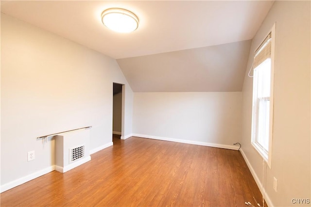 533 Mundy St, Watertown-City, NY 13601 - bonus room featuring wood finished floors, lofted ceiling, and baseboards
