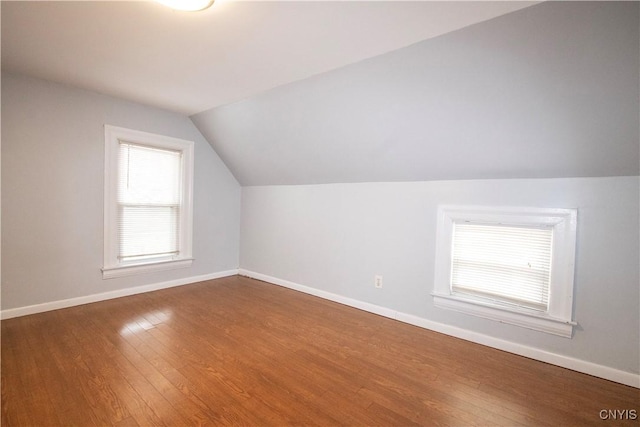 533 Mundy St, Watertown-City, NY 13601 - additional living space featuring lofted ceiling, wood finished floors, and baseboards