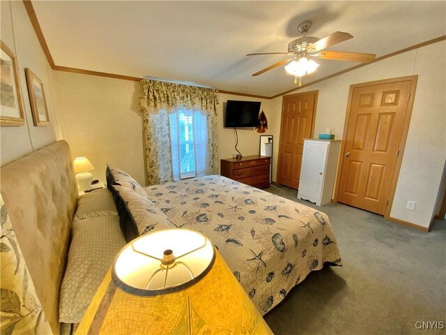 2570 Humphrey Rd, Cape Vincent, NY 13618 - carpeted bedroom with ornamental molding, vaulted ceiling, a ceiling fan, and baseboards