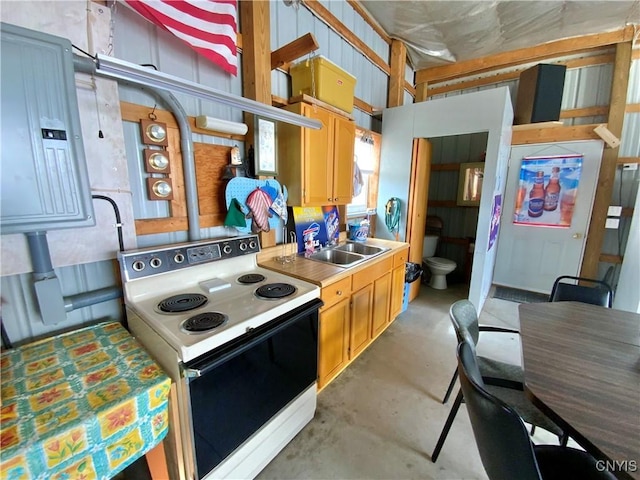 2570 Humphrey Rd, Cape Vincent, NY 13618 - kitchen with electric range, a sink, electric panel, and concrete floors