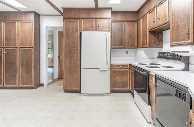 115 Stafford Dr, Rutland, NY 13612 - kitchen featuring white appliances, light countertops, and light floors