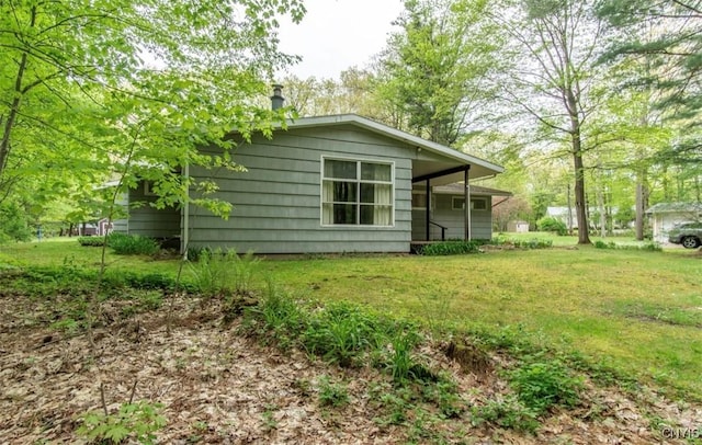 115 Stafford Dr, Rutland, NY 13612 - rear view of property with a lawn