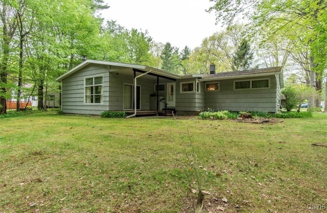 115 Stafford Dr, Rutland, NY 13612 - view of front facade featuring a front yard and a chimney