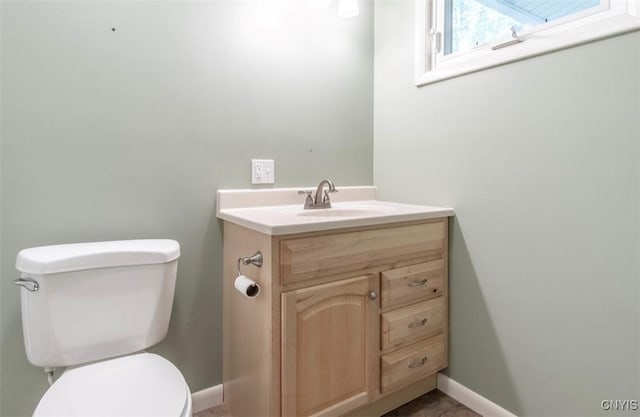 115 Stafford Dr, Rutland, NY 13612 - half bath featuring vanity, toilet, and baseboards