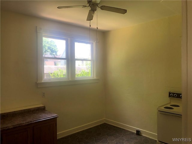 515 9th St, Niagara Falls, NY 14301 - spare room with baseboards and ceiling fan