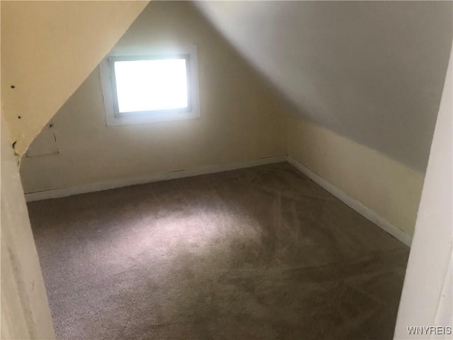 515 9th St, Niagara Falls, NY 14301 - additional living space with carpet flooring, lofted ceiling, and baseboards
