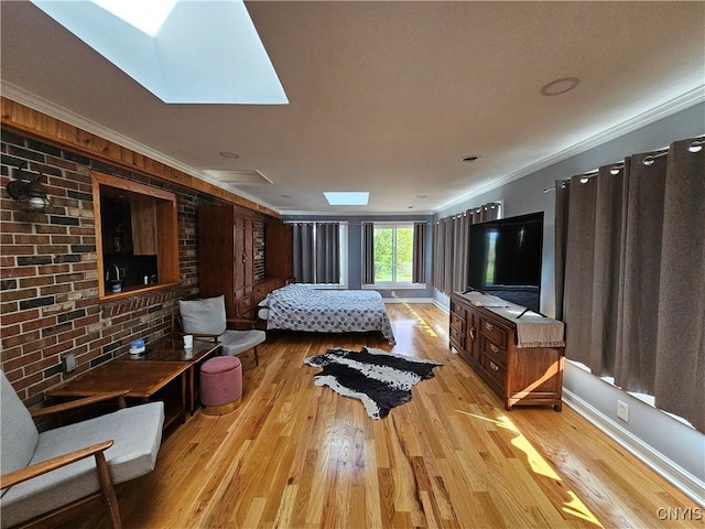 5813 Grace Rd, Deerfield, NY 13502 - bedroom featuring ornamental molding, wood finished floors, a skylight, and baseboards