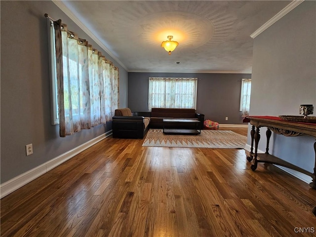 5813 Grace Rd, Deerfield, NY 13502 - living room featuring crown molding, baseboards, and wood finished floors