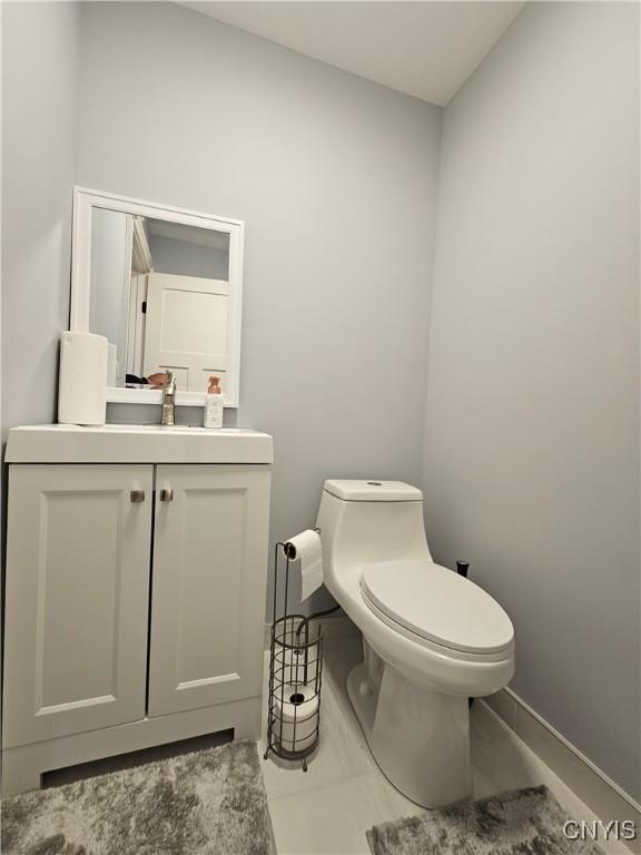 5813 Grace Rd, Deerfield, NY 13502 - half bath featuring toilet and vanity