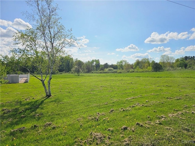 5813 Grace Rd, Deerfield, NY 13502 - view of grassy yard featuring a view of rural / pastoral area