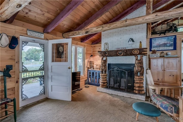 1 Haloah, Hammond, NY 13646 - living room with carpet flooring, wooden ceiling, wooden walls, and a brick fireplace