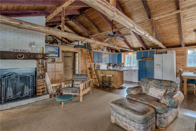 1 Haloah, Hammond, NY 13646 - living area with wood ceiling, healthy amount of natural light, ceiling fan, and a brick fireplace