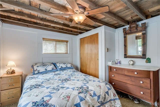 1 Haloah, Hammond, NY 13646 - bedroom featuring wooden ceiling, beamed ceiling, a closet, and a ceiling fan