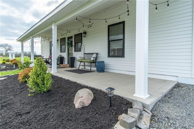 26618 Three Mile Point Rd, Lyme, NY 13622 - view of patio / terrace featuring a porch