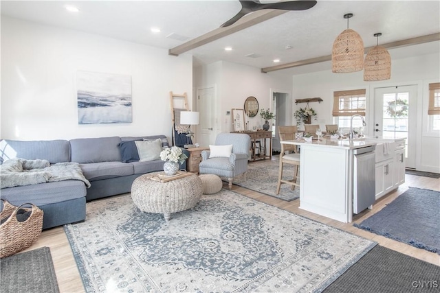 26618 Three Mile Point Rd, Lyme, NY 13622 - living room featuring light wood-style floors, a ceiling fan, recessed lighting, and beamed ceiling