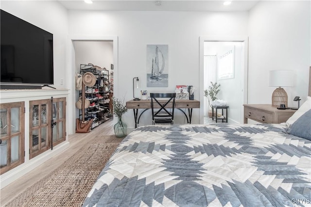 26618 Three Mile Point Rd, Lyme, NY 13622 - bedroom featuring wood finished floors and recessed lighting