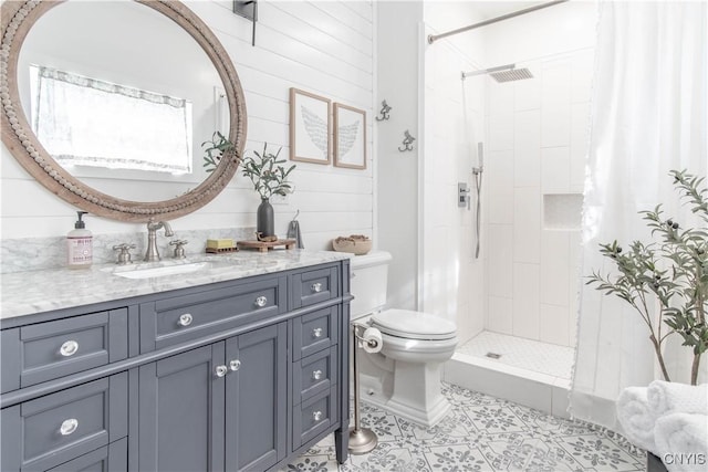 26618 Three Mile Point Rd, Lyme, NY 13622 - full bathroom with toilet, a tile shower, tile patterned flooring, and vanity