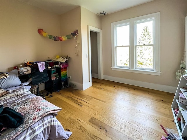 442 Front St, Owego, NY 13827 - bedroom featuring light wood-style flooring and baseboards