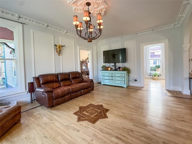 442 Front St, Owego, NY 13827 - living room with a chandelier and wood finished floors