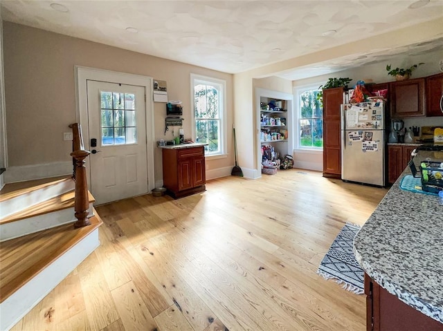 442 Front St, Owego, NY 13827 - entrance foyer with light wood-style floors and baseboards