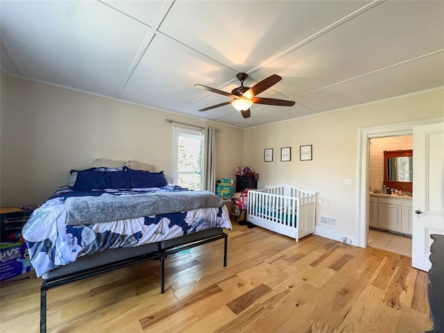442 Front St, Owego, NY 13827 - bedroom featuring light wood-style flooring, a ceiling fan, and ornamental molding