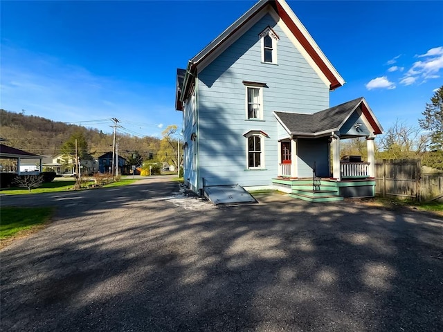 442 Front St, Owego, NY 13827 - rear view of house with fence and covered porch