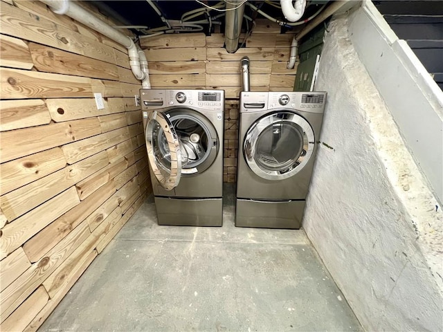 808 Center St, Horseheads, NY 14845 - laundry room with separate washer and dryer and wood walls