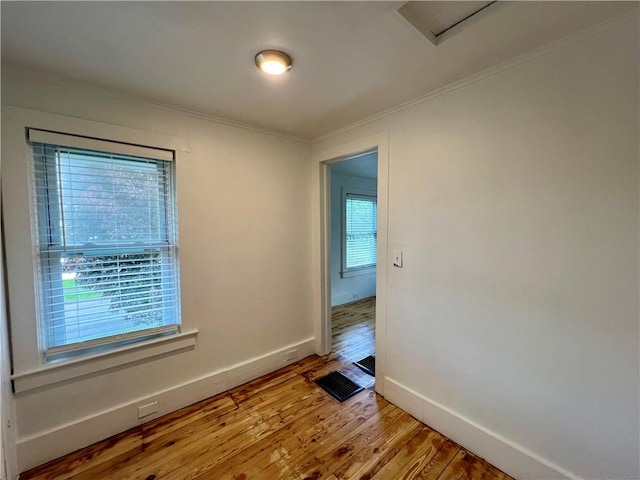 808 Center St, Horseheads, NY 14845 - empty room with ornamental molding, baseboards, and wood finished floors